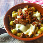 Gnocchi con finferli, speck e provola affumicata